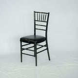 Black resin banquet chair with cushion