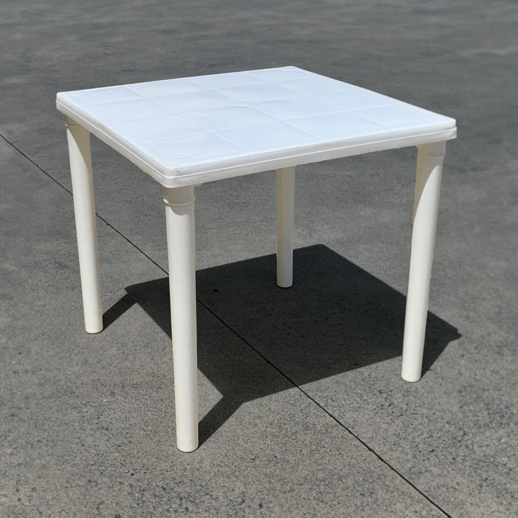 Square white plastic table for hire